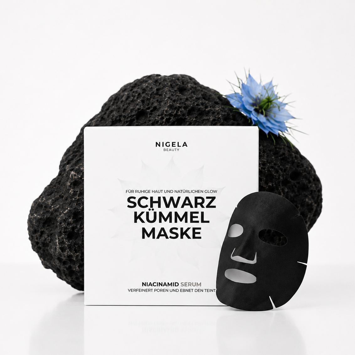 Nigela-Schwarzkümmel-Maske-Gesicht