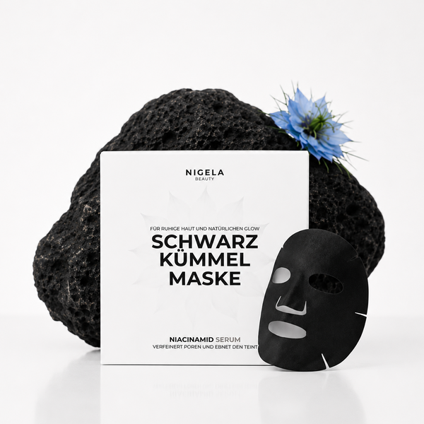 Nigela-Schwarzkümmel-Maske-Gesicht